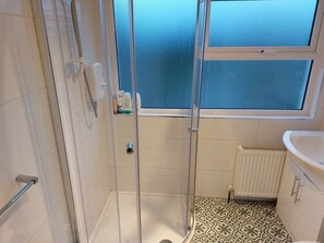 Bathtub, hair dryer, towels