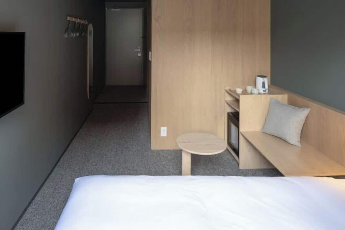 Desk, free WiFi, bed sheets