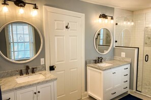 Shower, hair dryer, towels, soap