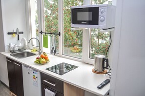 Quadrupla Luxury | Cucina privata | Frigorifero, microonde, piano cottura, bollitore elettrico