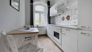 Fridge, stovetop, coffee/tea maker, electric kettle