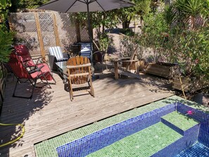 A wooden deck with a small pool, outdoor furniture, and potted plants. - 4 bedroom house, Panoramic view of the Saint Paul de Vence region (ST PAUL)