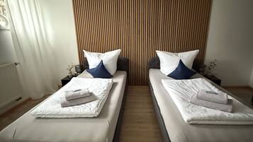 2 habitaciones, cuna de viaje, wifi gratis y ropa de cama