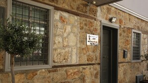 A stone building with a sign for 'Castle Inn Boutique Hotel'. - Castle Inn Boutique Hotel (Antalya)