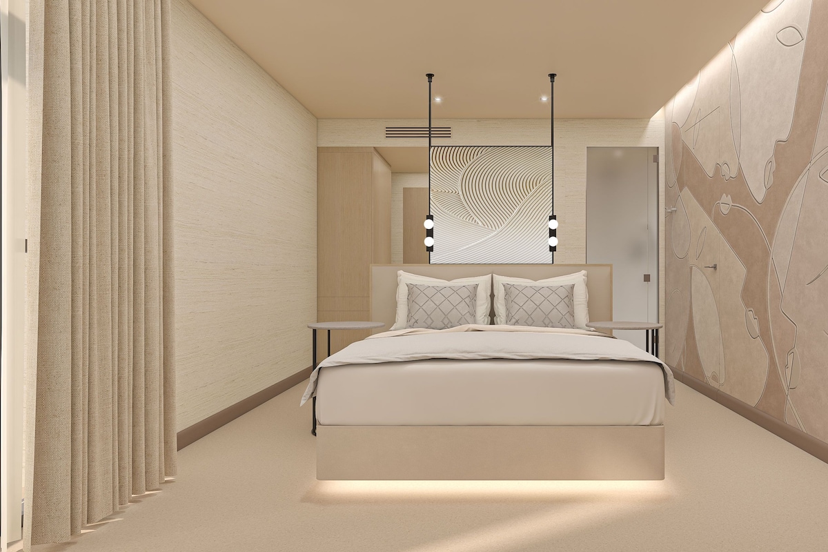 Un dormitorio moderno con una cama, mesitas de noche y una pared decorada con motivos abstractos.