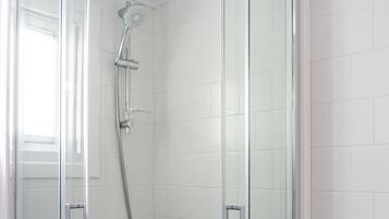 Shower, towels, toilet paper