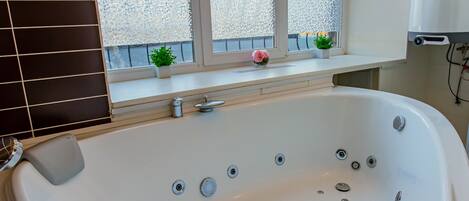 Combined shower/bathtub, jetted bath