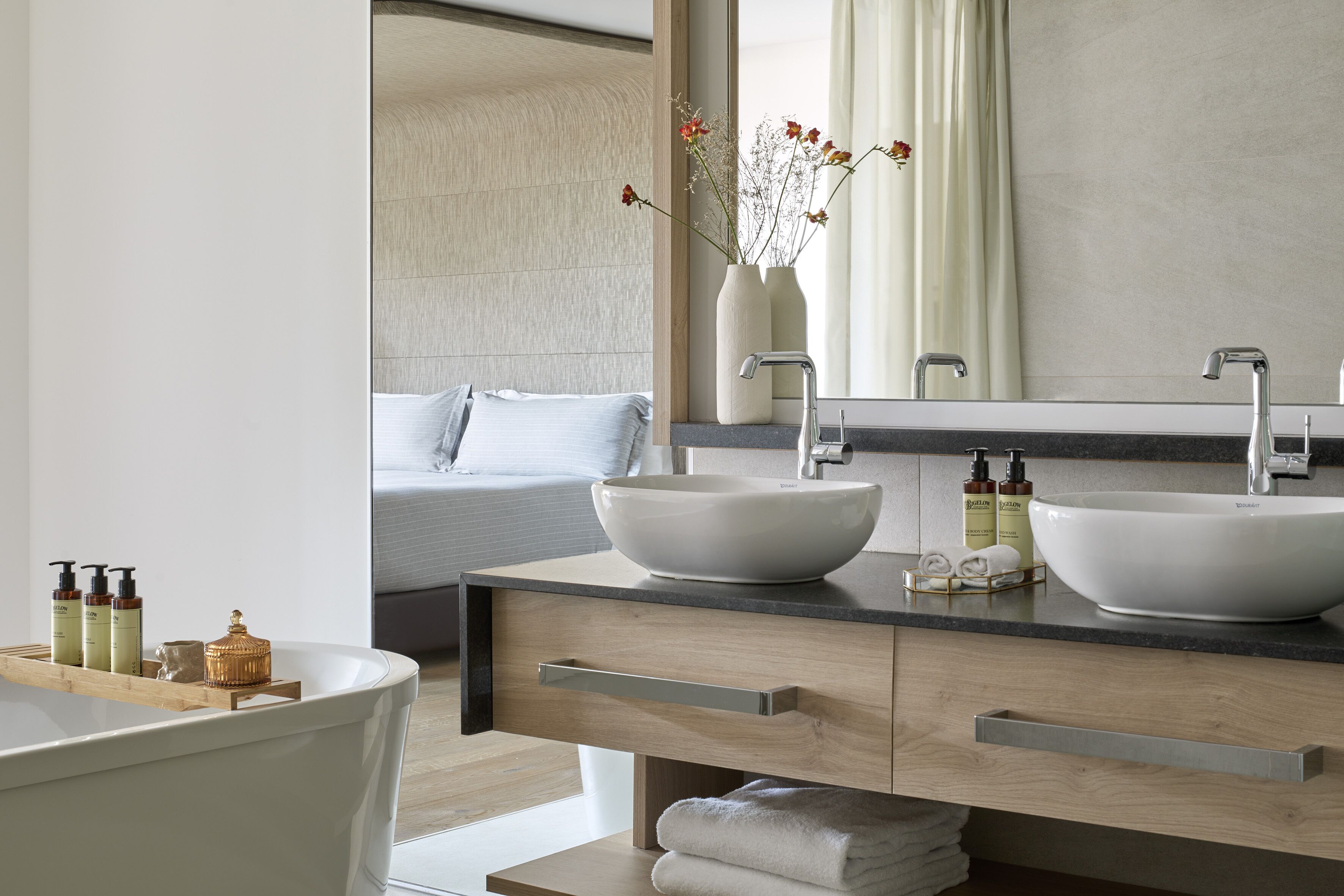 hair dryer, bathrobes, slippers, towels