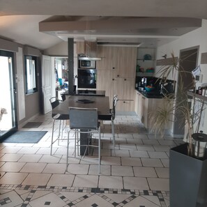 Oven, dining tables, kitchen islands