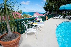 Outdoor pool - Spacious Luxury Open Plan Condo: Convenient Location.  Large Balcony. Sea View. (Christiansted)