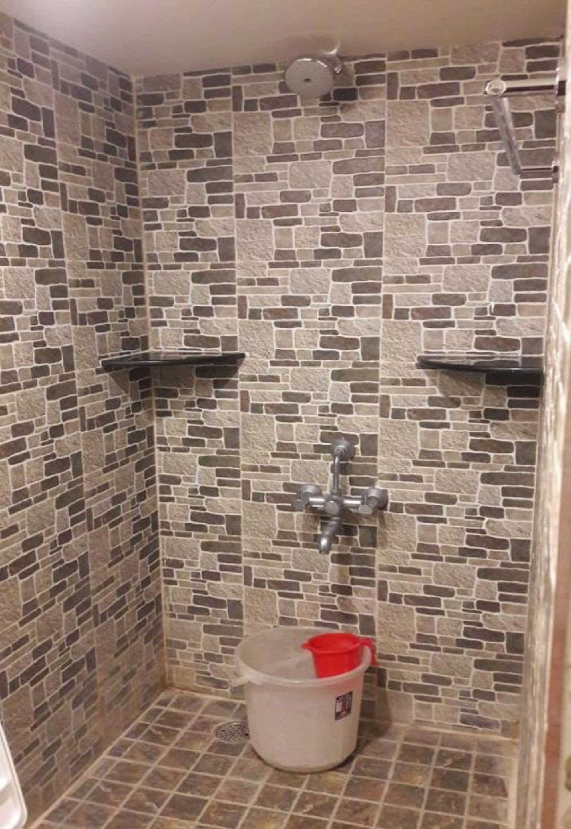 Shower, rainfall showerhead, towels
