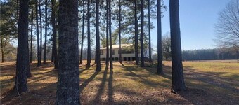 40 Acres 4 Bedroom 4 full bathroom Home with a Pond stocked with Fish & RV Port