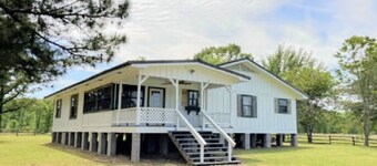 40 Acres 4 Bedroom  4 full bathroom Home with a Pond stocked with Fish & RV Port