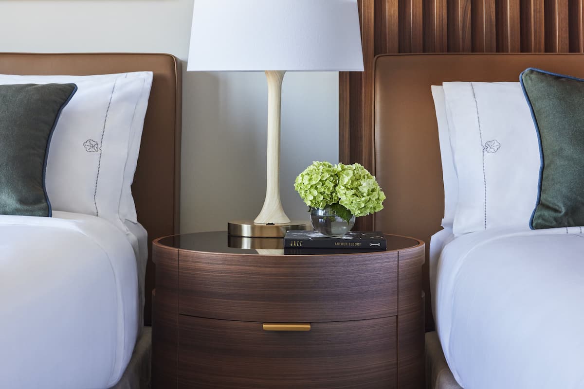 Premium bedding, down comforters, pillowtop beds, in-room safe