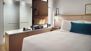 Premium bedding, down comforters, pillowtop beds, in-room safe