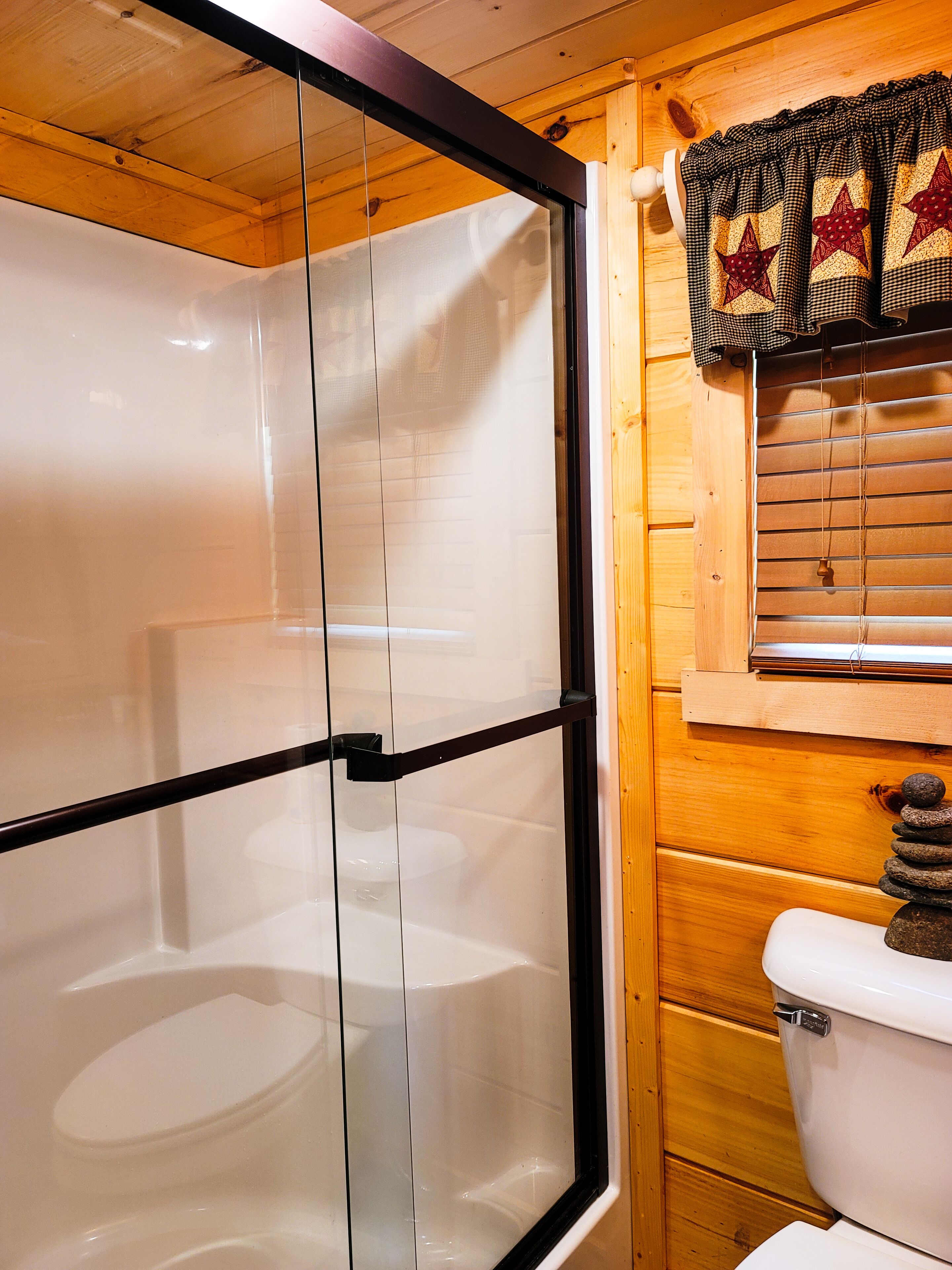 Luxury tiny cabin on the Valley River with mountain views.