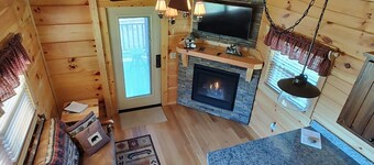 Luxury tiny cabin on the Valley River with mountain views.