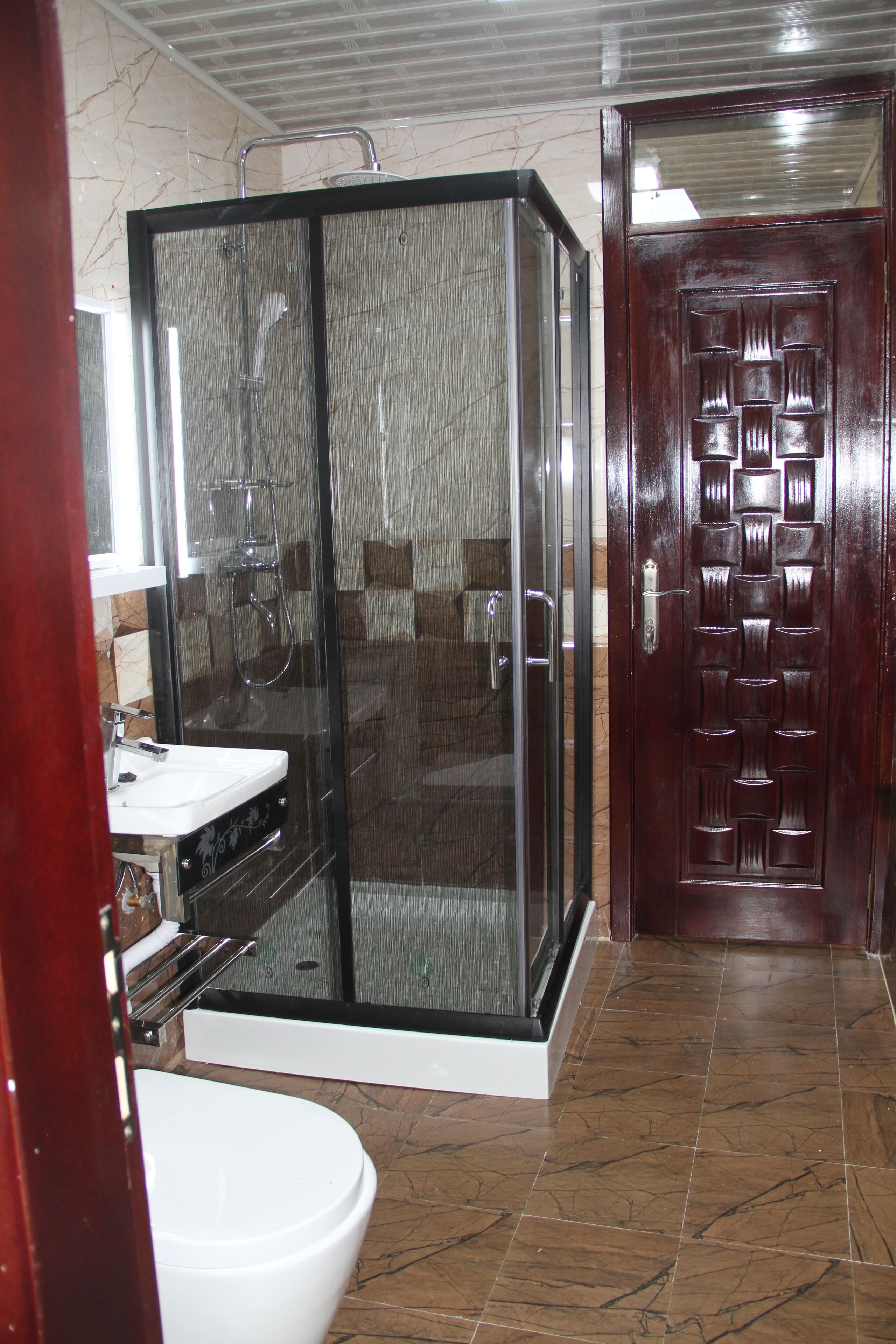Bathtub, towels, soap, toilet paper