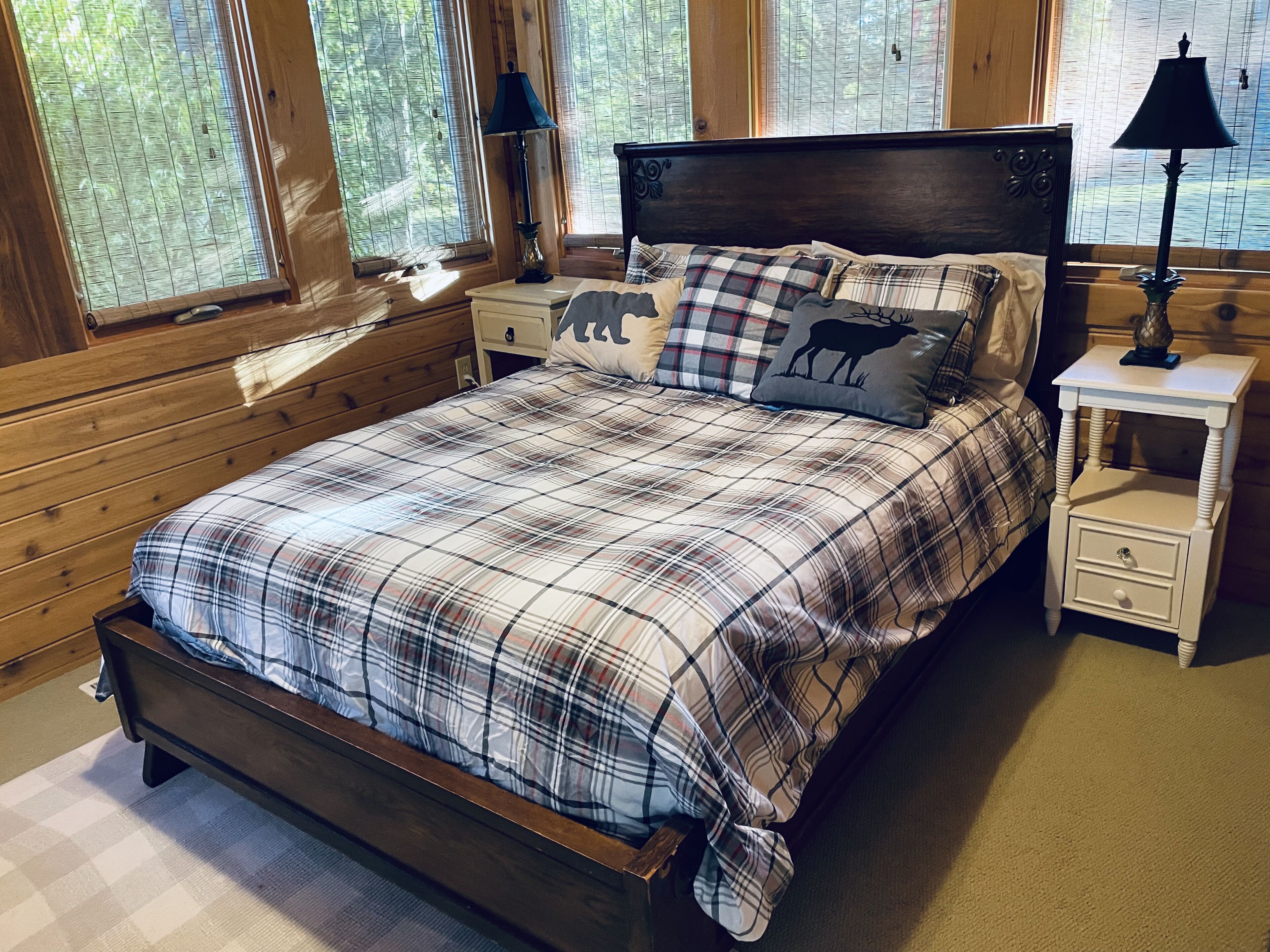 Coach house guest bedroom with full size bed