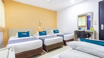 Quadruple Room | Hypo-allergenic bedding, minibar, desk, laptop workspace