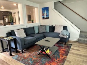 TV, fireplace, books, offices