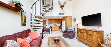 Télévision, cheminée, chaîne hi-fi