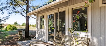 Adorable cottage near the beach w/ wood stove, firepit, & full kitchen