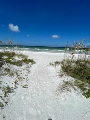 On the beach, sun loungers, beach towels - "Beachfront Bliss! 10% Off Week-Long or 15% Off Monthly Stays at Indian Rocks" (Indian Rocks Beach)