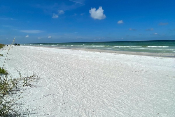 On the beach, sun-loungers, beach towels