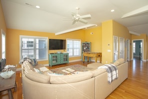 Smart TV, DVD player, foosball, books