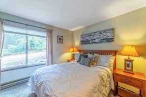 1 bedroom, desk, iron/ironing board, travel crib