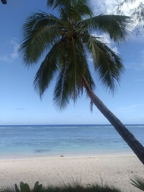 On the beach, sun loungers, beach towels