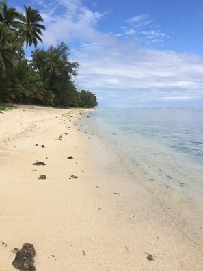 On the beach, sun loungers, beach towels