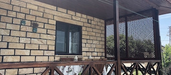 Stone village house with garden in the mount Ida