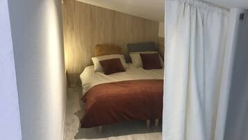1 chambre, fer et planche Ă repasser, Wi-Fi gratuit, draps fournis