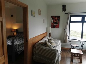 Departamento, varias camas | 2 habitaciones, tabla de planchar con plancha y wifi gratis