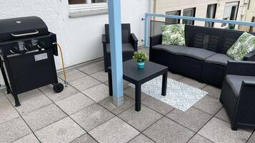 Comfort-Apartment | Wohnbereich | 81-cm-Smart-TV mit Kabelempfang, Fernseher, Netflix