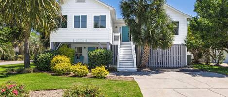 Welcome to Sandy Cheeks, a fully renovated 6-bedroom, 4-bathroom home on the elite Isle of Palms