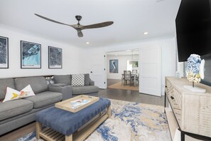 TV - Spacious Isle of Palms Beach Home with Hot Tub, Game Room, & Modern Amenities (Isle Of Palms)