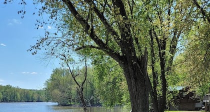 Relax on the Rock River in fall, book our cozy 1-bedroom cabin!