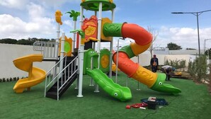 A playground with slides and climbing structures. - LUXURY EN EL MONUMENTO DE SANTIAGO DE LOS CABALLEROS (Santiago De Los Caballeros)