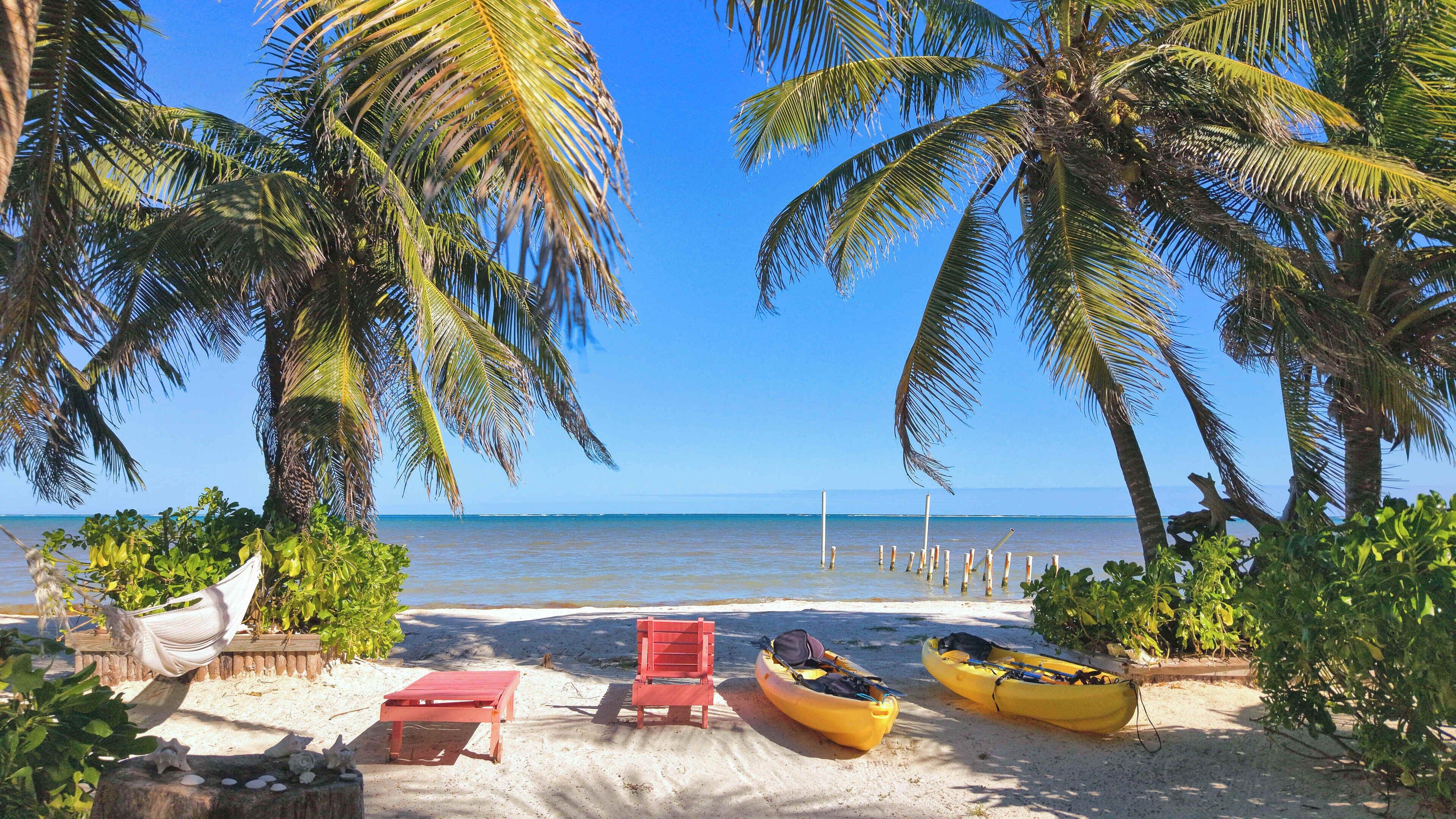On the beach, sun-loungers, beach towels