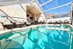 Outdoor pool, a heated pool, pool loungers