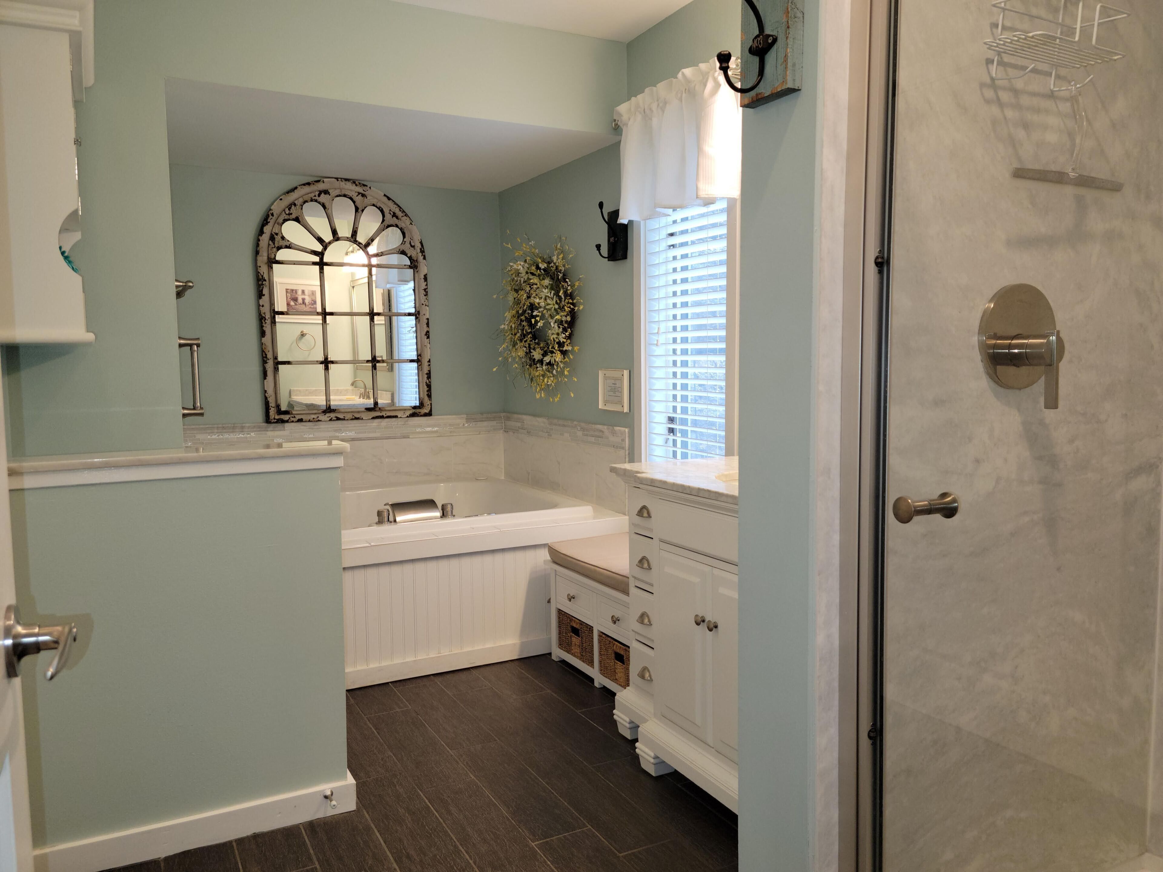 Shower, jetted tub, towels