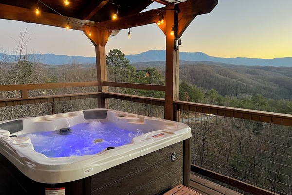 Soak in the panoramic sunset in the four-person hot tub.