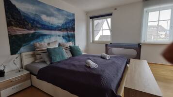 3 habitaciones, tabla de planchar con plancha, wifi y ropa de cama