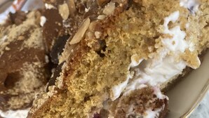 A plate of cake with cream and nuts. - The Finca - Your vacation in the Spanish Rhön (Hünfeld)