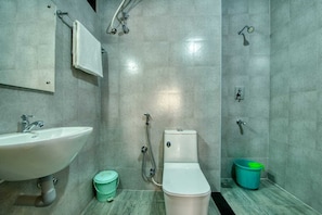 Shower, rainfall showerhead, towels