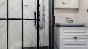 Standard Double Room | Bathroom | Shower, hair dryer, slippers, towels
