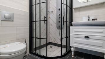 Standard Double Room | Bathroom | Shower, hair dryer, slippers, towels